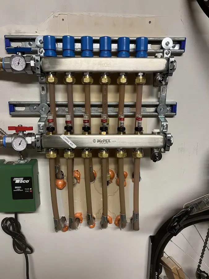 Plumber performing Gas Line Installation at a residential property in Converse